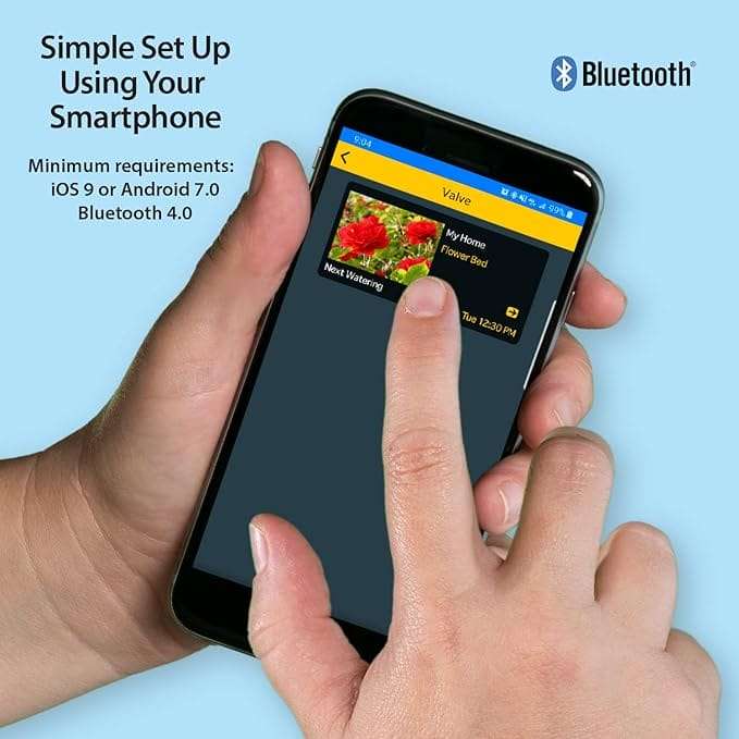 A hand holding and interacting with a smartphone displaying a gardening app interface, titled "Simple Set Up Using Your Smartphone" with Bluetooth and OS requirements listed below. omahagardener.com